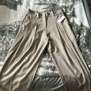 Never warn beige urban outfitters pleated pants
